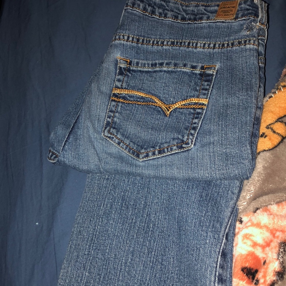 Size seven jeans. Tall. No holes. Never worn